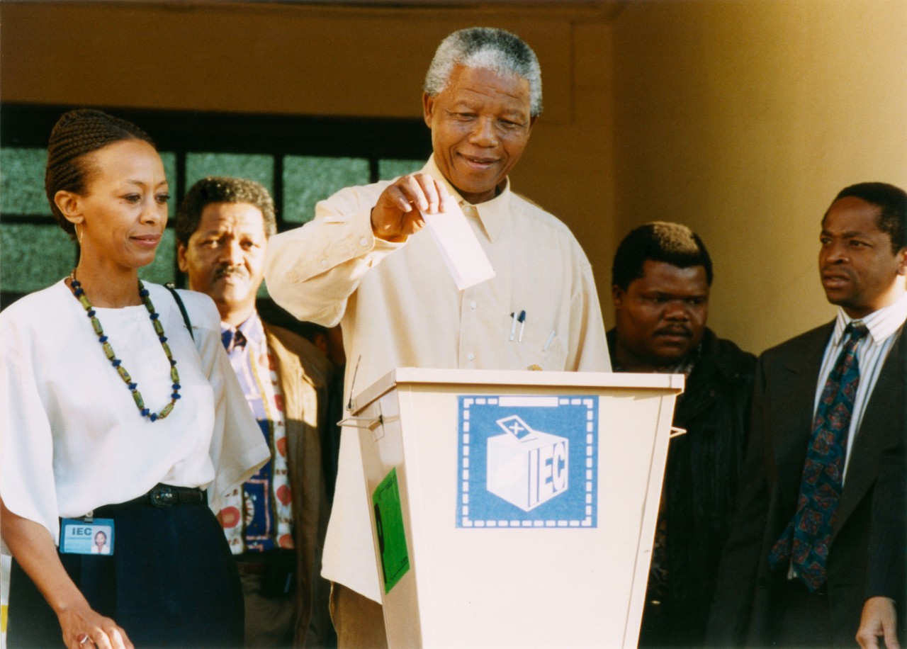 McDougall (left) with Nelson Mandela and others
