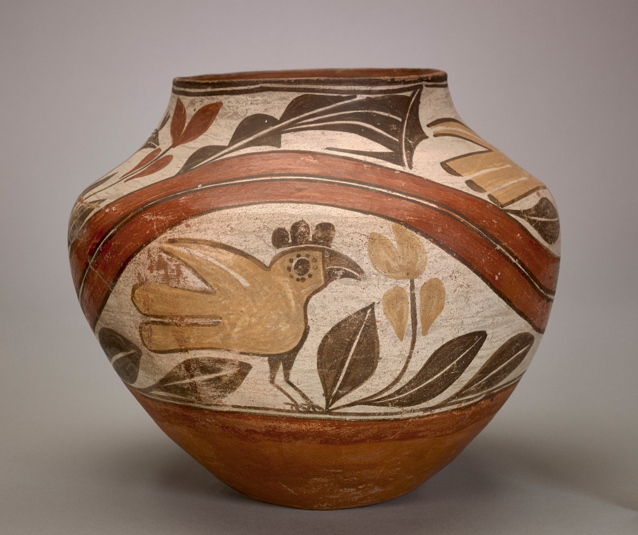 Unidentified Zia artist, Polychrome pot with yellow birds separated by double red lines, ca. 1920, clay with pigment