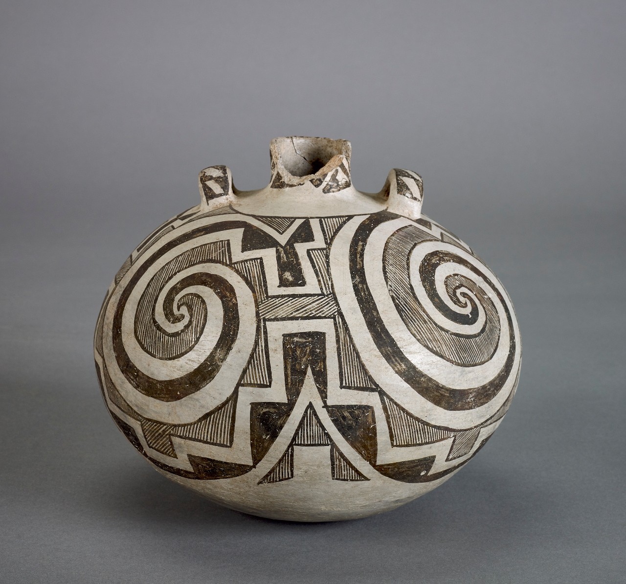 Unidentified Ancestral Puebloan artist, Water jug decorated with swirling patterns, ca. 1200, clay with pigment