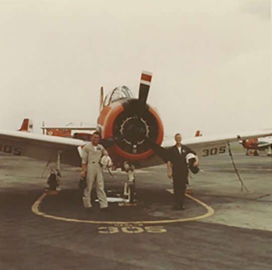Jim Shea and Tom Nequete by VT-3 Training Aircraft