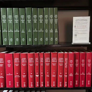 An image of bound books containing Master's Projects and Theses 
