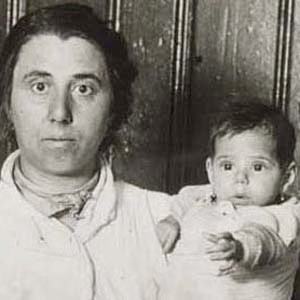 Black and white photo of a woman with a baby