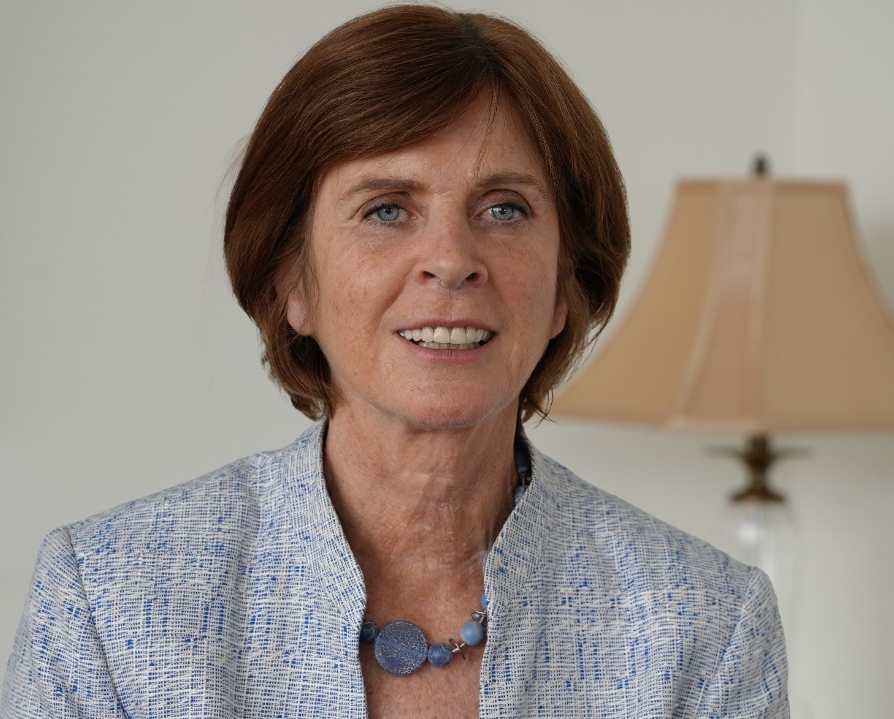 color photo of Dame Louis Richardson in a blue suit