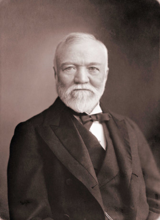 Black and white portrait photo of Andrew Carnegie in a suit
